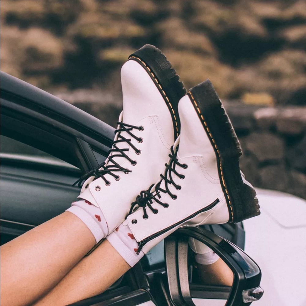 Dr. Martens Black and White Combat Boots with Lace-Up Design
